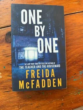 One by One - Blue Covered Paperback Coffee Table Book